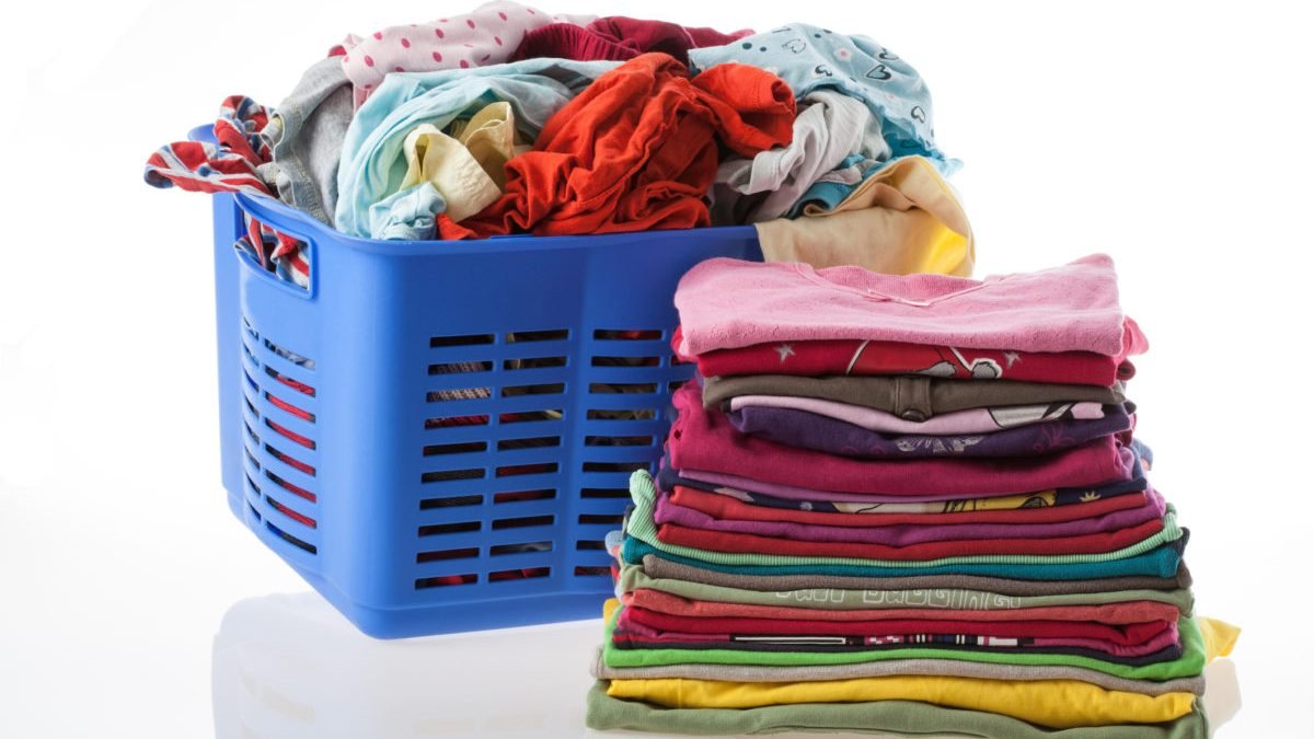 Freshly folded laundry prepared for customer pickup