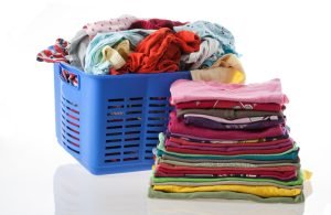 Freshly folded laundry prepared for customer pickup