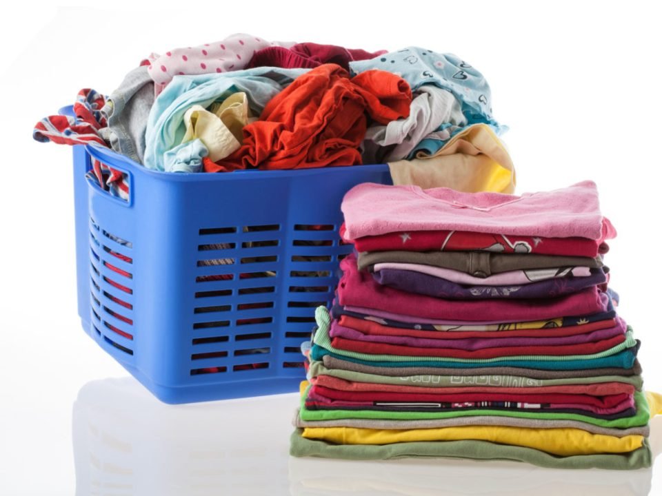 Freshly folded laundry prepared for customer pickup