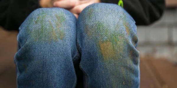 grass stains before professional wash-dry-fold service