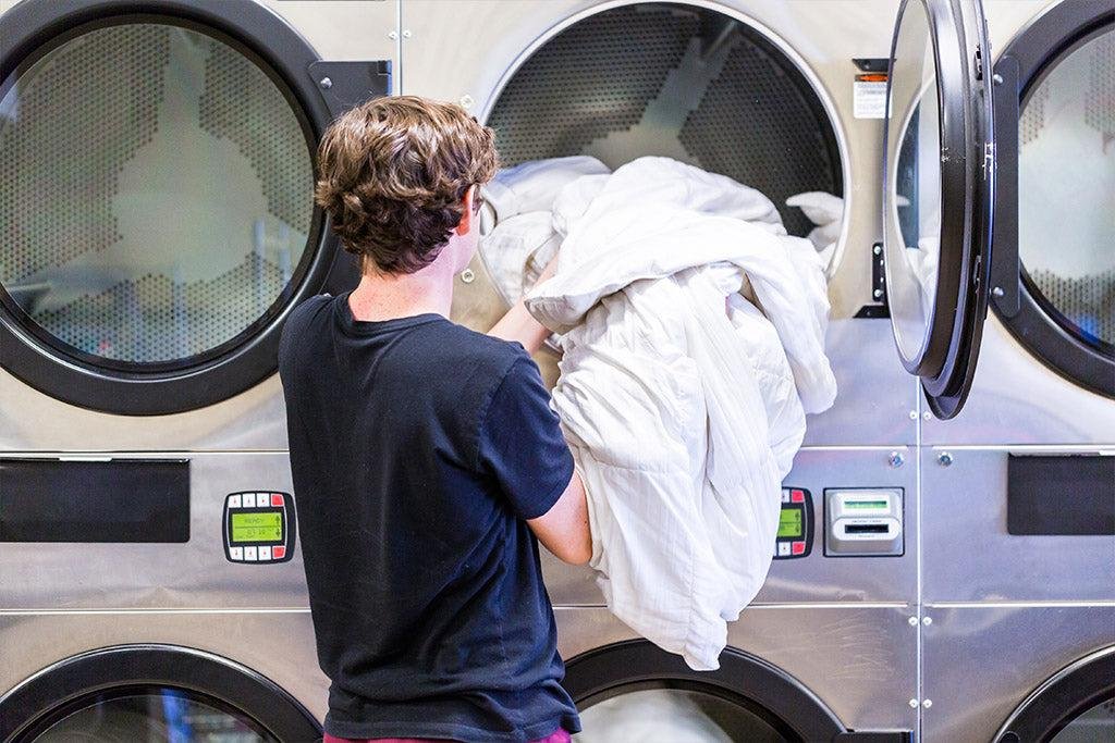 Large commercial dryer drying a king size comforter quickly and evenly