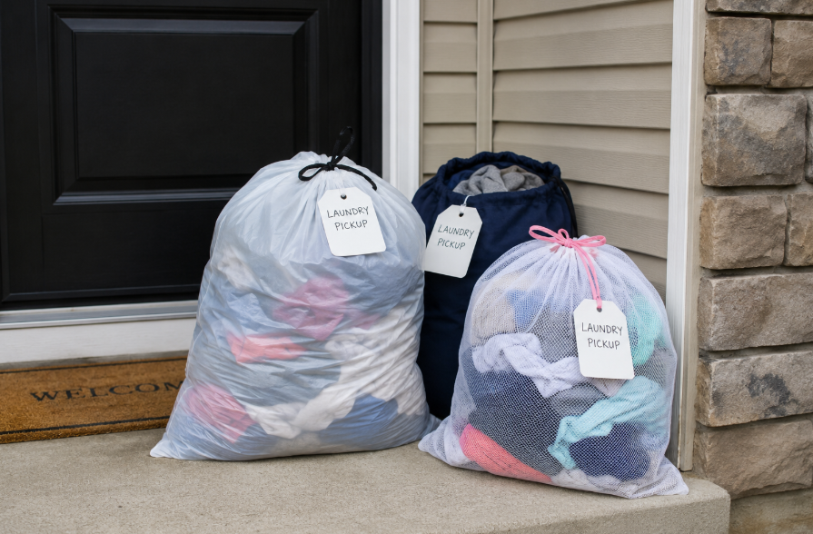 Laundry bags waiting for scheduled pickup at a Wayne Michigan home