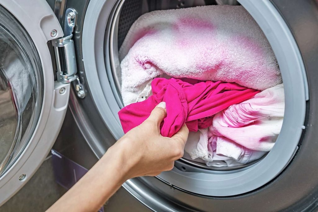 Pink shirt causing dye transfer onto white clothes