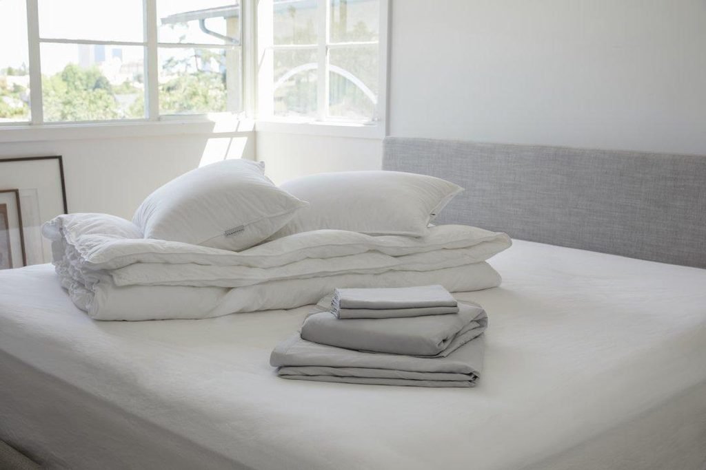 Clean comforters and bedding as part of convenient laundry solutions for seniors.
